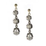 A PAIR OF DIAMOND EARRINGS  with larger pear shaped diamond, in gold, fully articulated  ++In fine