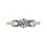 A DIAMOND RING  with three old cut diamonds, in gold marked 18ct, size O ++In good second hand