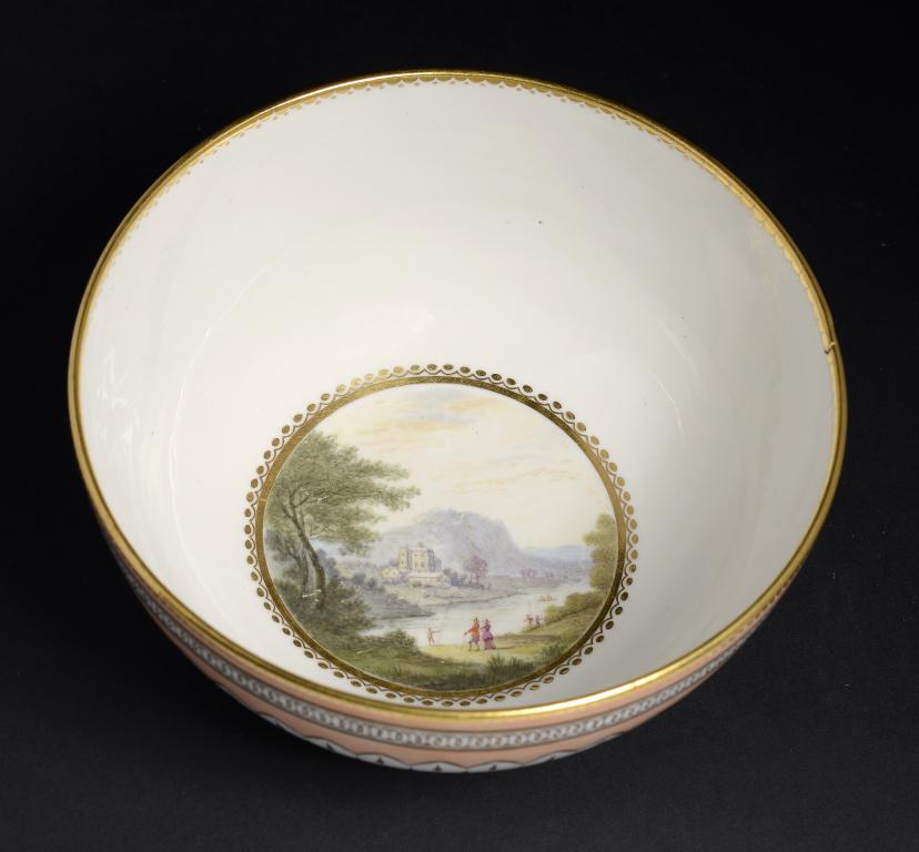 A DERBY SLOP BASIN, C1790 painted by Zachariah Boreman with a landscape, 16.5cm diam, puce painted