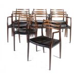 A SET OF EIGHT DANISH ROSEWOOD CHAIRS AND A DINING TABLE DESIGNED BY NIELS O MOLLER AND MANUFACTURED