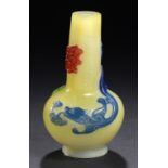 A CHINESE TRIPLE OVERLAY GLASS VASE, 20TH C overlaid in red, blue and green glass and carved with