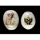 TWO RUSSIAN PORCELAIN EASTER EGGS, C1890  finely painted and gilt with the Imperial arms beneath the