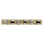 A DIAMOND, ONYX AND GOLD BRACELET  marked 14k ++In good second hand condition with light signs of