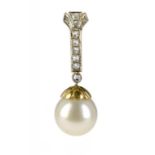 A CULTURED PEARL AND DIAMOND PENDANT  with 11.5mm cultured pearl, in gold, foreign control mark ++In