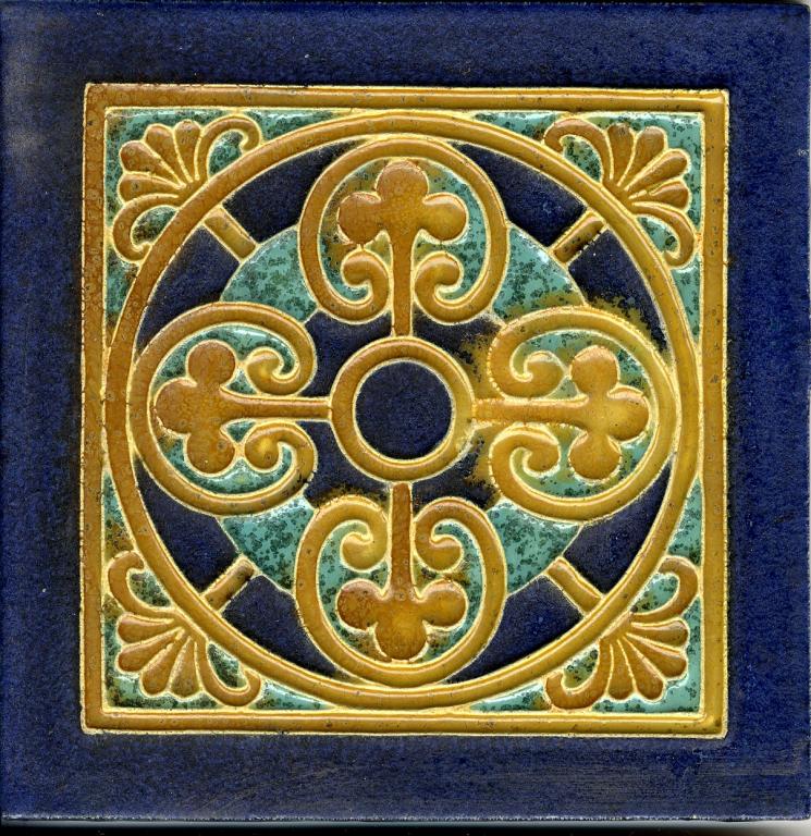 TWENTY-ONE DUTCH EIGHT INCH CLOISONNÉ BLUE GROUND TILES, DESIGNED BY L E F BODART AND MANUFACTURED