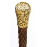 A QUEEN ANNE SILVER PIQUÉ AND IVORY HANDLED WALKING STICK, C1710  the carved stick of later date,