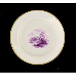 A PINXTON CUP PLATE, C1800 painted in purple monochrome with a landscape, 12.5cm diam A monochrome