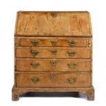 A GEORGE II WALNUT BUREAU, C1750  with straight fitted interior, the sides of pine, 100cm h; 48 x