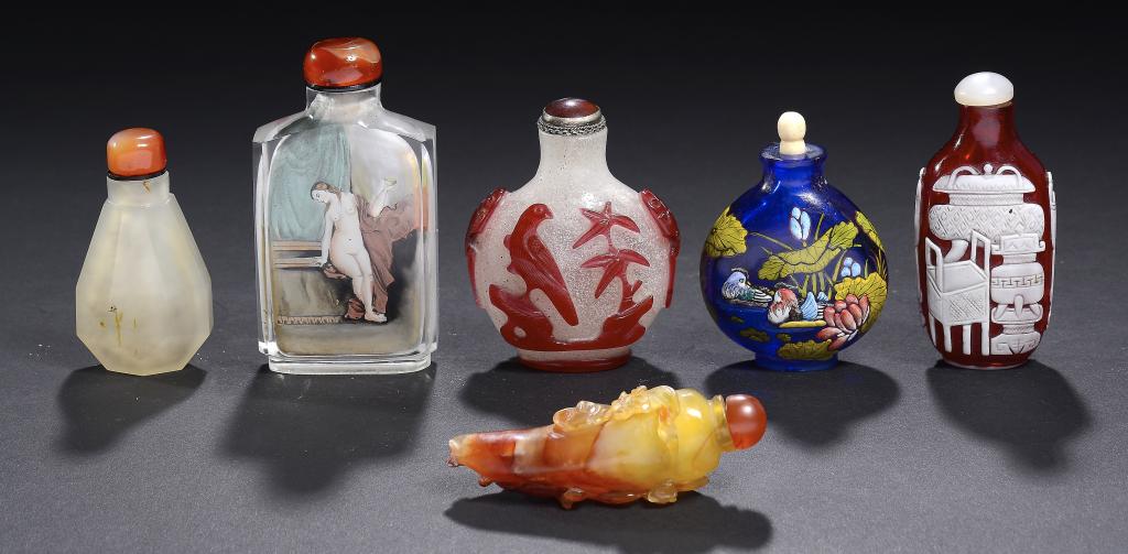 SIX CHINESE SNUFF BOTTLES  comprising red overlay snowflake glass carved with a bird and tethered