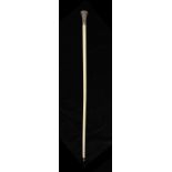 AN INDIAN IVORY ONE-PIECE WALKING CANE, MID 19TH C  the flared silver repoussé handle with scrolling