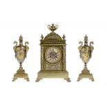 A FRENCH ORMOLU GARNITURE DE CHEMINEE, C1880 with panels of finely chiselled scenes, caryatids and