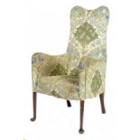 AN ARTS & CRAFTS ARMCHAIR IN THE MANNER OF LIBERTY & CO, C1905  on stained beech legs, 122cm h ++