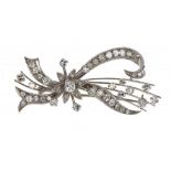 A DIAMOND SPRAY BROOCH  with mixed round brilliant and other diamonds in white gold ++In fine