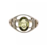 A MURRLE BENNETT & CO SILVER RING, C1905-10  set with a peridot, marked M.B.C. and 950, size O ++