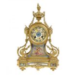 A FRENCH ORMOLU MANTLE CLOCK IN LOUIS XV STYLE, C1880  the case inset with Sèvres style panels