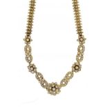 A GOLD AND SPLIT PEARL FLOWERHEAD NECKLACE, C1900 fully articulated ++Complete and in good condition