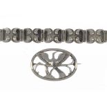 A GEORG JENSEN SILVER BROOCH 238, 1933-44  maker's marks and a Hans Hansen silver bracelet, maker'