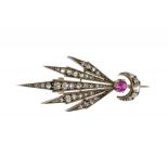 AN UNUSUAL RUBY AND DIAMOND COMET BROOCH, C1910 The only comet clearly visible to the naked eye from