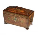 A GEORGE IV CUT BRASS AND EBONY INLAID TEA CADDY, C1820  the interior retaining the original brass