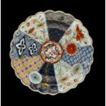 A WORCESTER FLUTED OLD RICH MOSAICK PATTERN PLATE, C1768-75 19.5cm diam, mock oriental mark ++Flat
