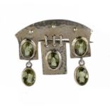 A MURRLE BENNETT & CO SILVER BROOCH, C1905-10  set with peridots, marked M.B.C. and 950 ++In very