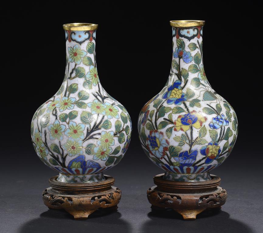 A PAIR OF CHINESE CLOISONNÉ ENAMEL OFF WHITE GROUND VASES, 20TH CENTURY 12.5cm h, wood stands ++