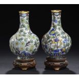 A PAIR OF CHINESE CLOISONNÉ ENAMEL OFF WHITE GROUND VASES, 20TH CENTURY 12.5cm h, wood stands ++