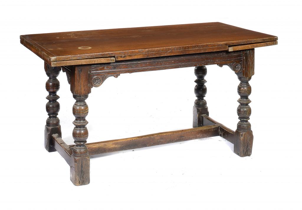 A 17TH CENTURY STYLE OAK DRAW LEAF TABLE, EARLY 20TH C  the top with cleated ends, 73cm h; 75 x