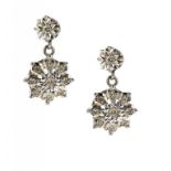 A PAIR OF DIAMOND CLUSTER EARRINGS  illusion set in white gold  ++In good second hand condition,