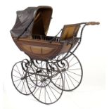 A VICTORIAN "LANDAU" BABY CARRIAGE BY J W WHITBY, NOTTINGHAM, C1880-85 the coachbuilt body painted