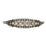 A DIAMOND, EMERALD AND RUBY BRACELET, C1900  with old cut mainly cushion shaped diamonds, in