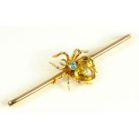 AN AQUAMARINE, CITRINE AND GOLD SPIDER BAR BROOCH BY SAUNDERS AND SHEPHERD, MARKED 9, EARLY 20TH