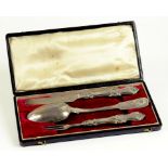 A VICTORIAN SILVER CHRISTENING SET, SHEFFIELD 1865, THE SPOON ASSOCIATED, MOROCCO CASE
