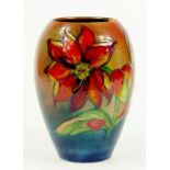 A MOORCROFT FLAMBÉ CLEMATIS VASE DESIGNED BY WALTER MOORCROFT, IMPRESSED MARKS, BLUE PAINTED