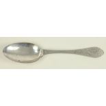 A CONTINENTAL SILVER TREFID SPOON, ENGRAVED WITH A TULIP, THE REVERSE OF THE STEM PRICKED WITH