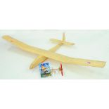 A BALSA WOOD MODEL AEROPLANE WITH ROBBE EF76 11 ELECTRIC MOTOR AND PROPELLER, A BOOK - THE AERO