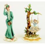 A CAPO DI MONTE FIGURE OF A GIRL ON A SWING AND A CAPO DI MONTE FIGURE OF A LADY