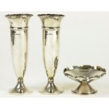 A PAIR OF GEORGE V SILVER VASES, BIRMINGHAM 1935, LOADED AND A SMALL SILVER BON BON DISH