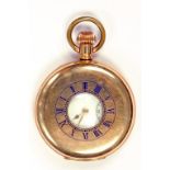 A GOLD PLATED KEYLESS LEVER HALF HUNTING CASED WATCH
