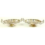 A PAIR OF EDWARD VII SILVER TWO HANDLED OVAL BON BON DISHES, LONDON 1904 AND 05, 14OZS 10DWTS