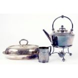 AN EPNS TEA KETTLE ON LAMPSTAND, AN ENTREE DISH AND A CHRISTENING MUG