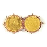 GOLD COINS.  HALF SOVEREIGN 1817 (2) MOUNTED IN A GOLD BAR BROOCH, 11.3G