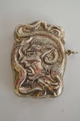 An unusual silver vesta case, chased fr
