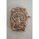 An unusual silver vesta case, chased fr