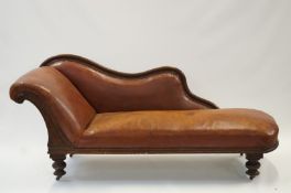 A 20th century chaise longue, upholstere