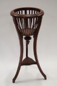 A Regency mahogany plant stand