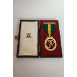 A cased George VI territorial medal