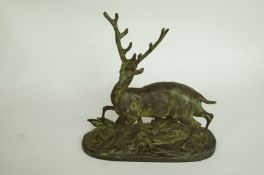 A metal figure of a stag