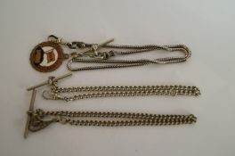 Three metal watch chains