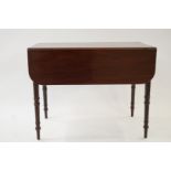 A Victorian mahogany drop leaf table